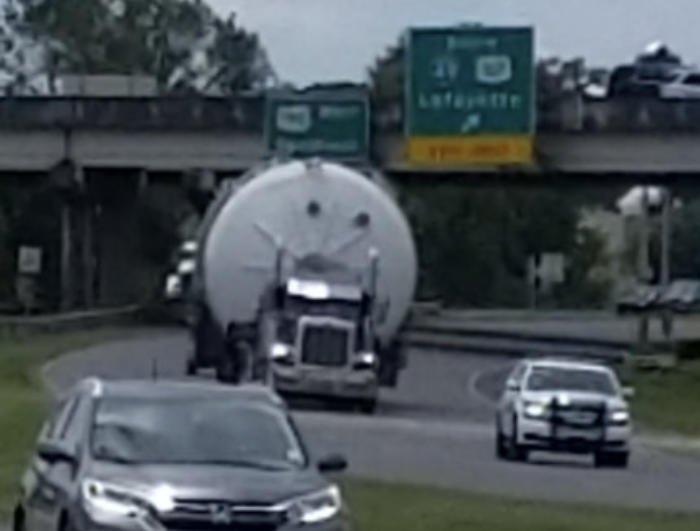 Turbine blade load passing beneath a highway overpass